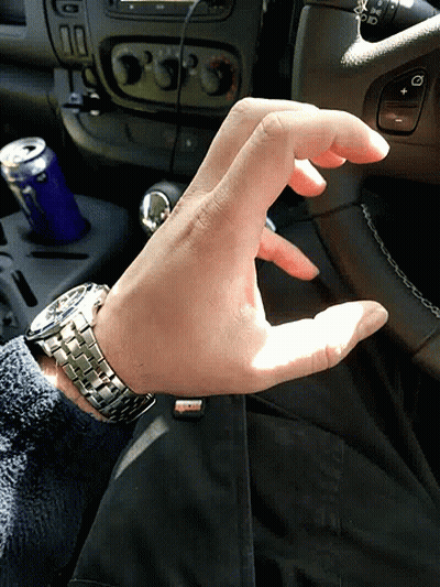 Man With Watch Sitting In Car With Soda GIF