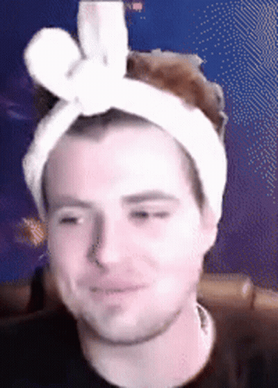 Man With White Bow Headband GIF