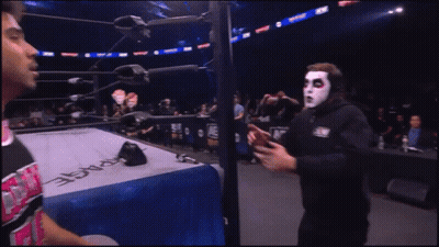Man With White Face And Red Eyes GIF