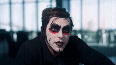 Man With White Face Paint And Red Eyes GIF