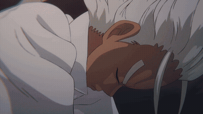 Man With White Hair Laying Down GIF