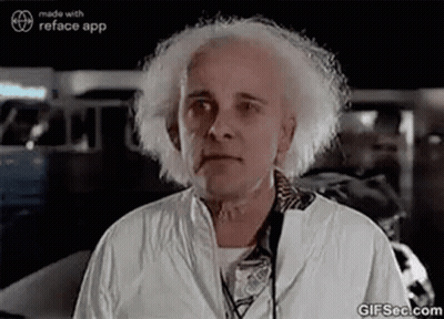 Man With White Hair Making Funny Face In Front Of Car GIF