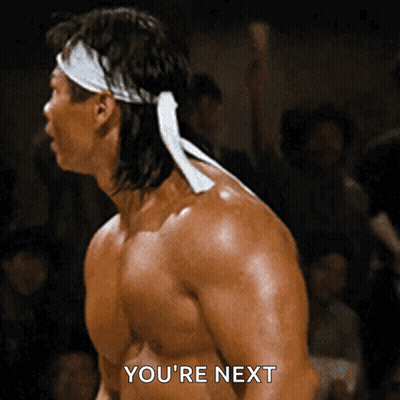 Man With White Headband Says Youre Next GIF