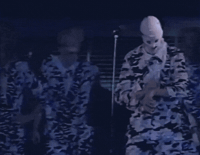 Man With White Mask At Microphone GIF