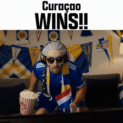 Man With Wig Holding Popcorn Bucket Curaçao Wins GIF