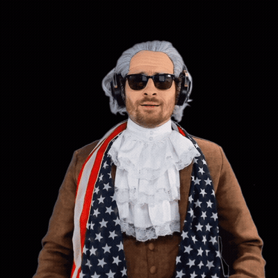 Man With Wig, Sunglasses, Headphones, American Flag Scarf GIF