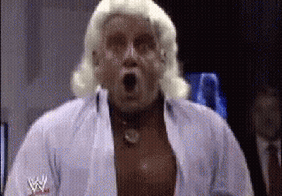 Man With Wig Wearing White W Shirt GIF