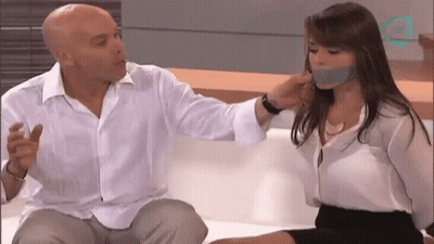 Man With Woman Taped To His Mouth GIF