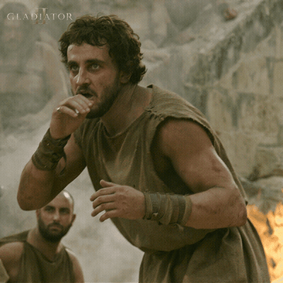 Man With Word Gladiator GIF