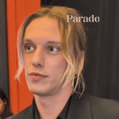Man With Word Parade Above Him GIF