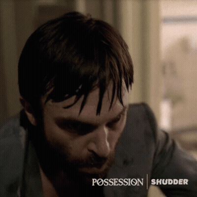 Man With Words Possession And Shudder GIF