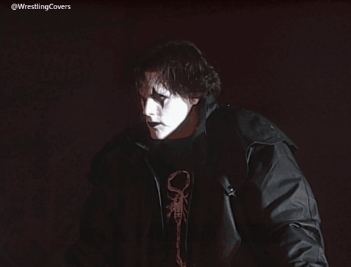Man With Wrestling Covers GIF