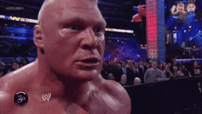 Man With Wrestling Logo On Chest GIF