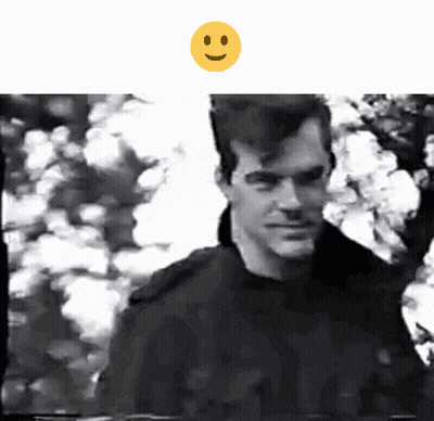 Man With Yellow Smiley Face Above GIF