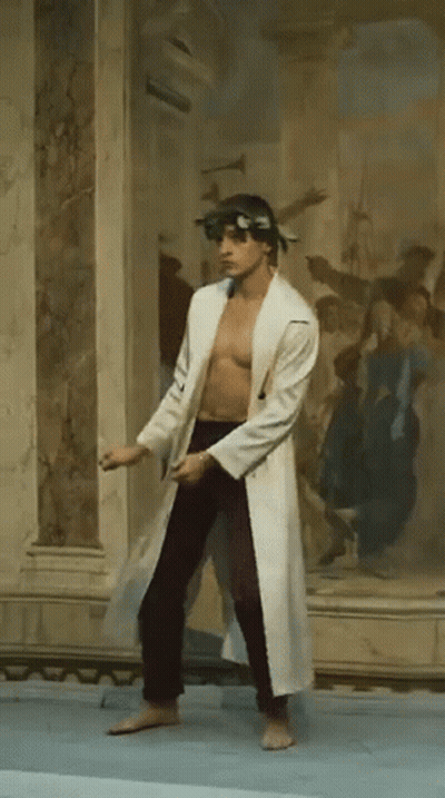Man Without Shirt Dancing In Front Of Painting GIF
