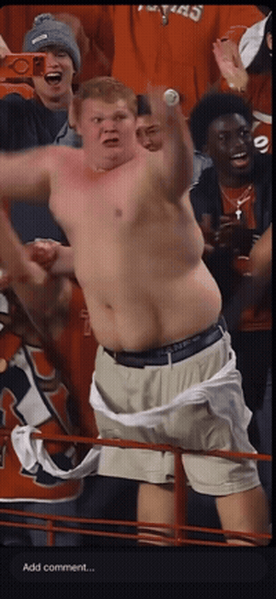 Man Without Shirt In Crowd Saying Add Comment GIF