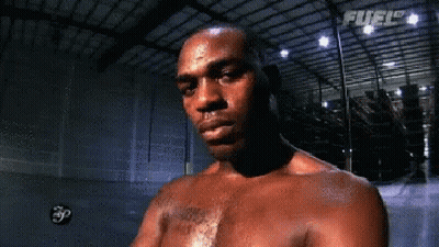 Man Without Shirt In Dark Room Fuel Ceiling GIF