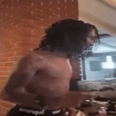 Man Without Shirt In Front Of Brick Wall Kitchen GIF