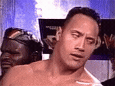 Man Without Shirt In Front Of The Rock Sign GIF