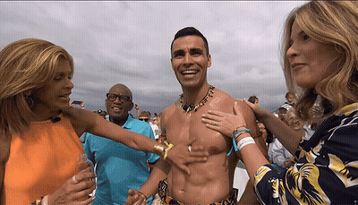 Man Without Shirt Interviewed By Woman GIF