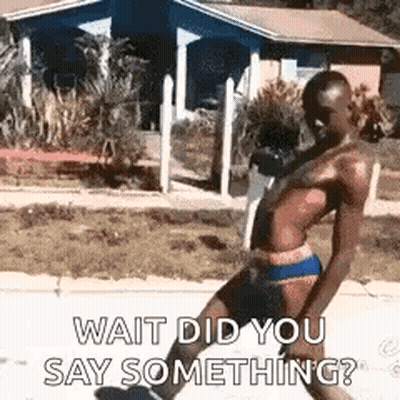 Man Without Shirt On Sidewalk GIF