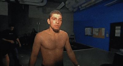 Man Without Shirt Standing In Dark Room GIF