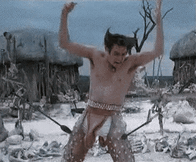 Man Without Shirt Standing In Field GIF