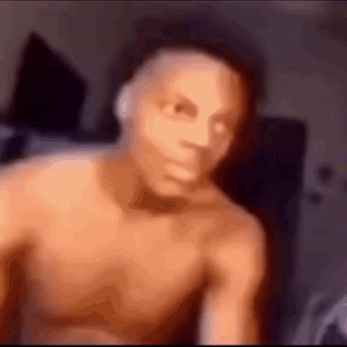 Man Without Shirt Taking Selfie With Mouth Open GIF