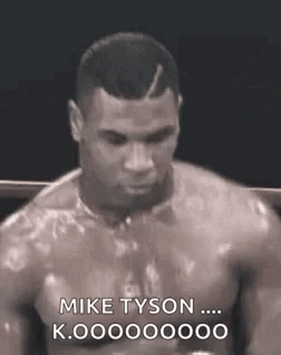 Man Without Shirt Talking To Mike Tyson GIF