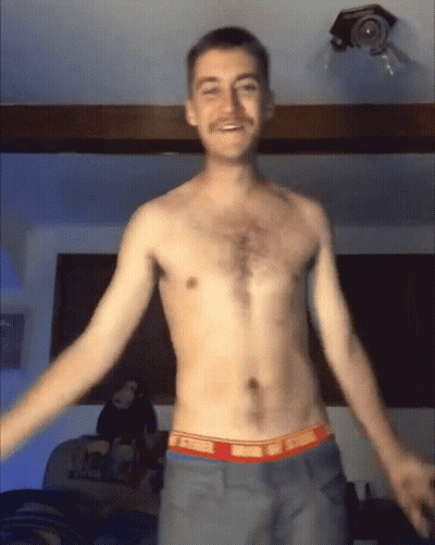 Man Without Shirt Wearing Snickers Underwear GIF