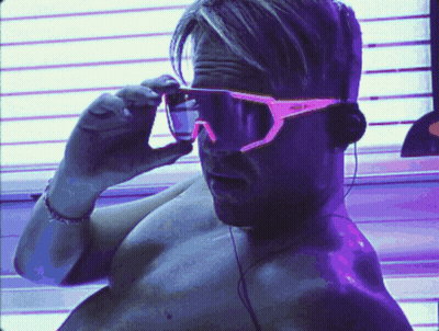 Man Without Shirt Wearing Sunglasses And Earbuds GIF