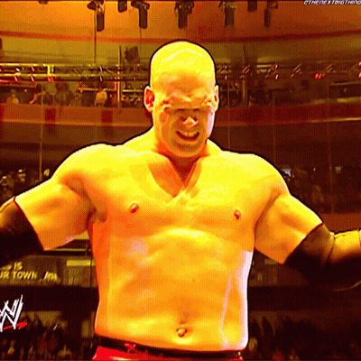 Man Without Shirt With N On Chest In Front Of Crowd GIF