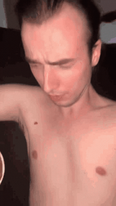 Man Without Shirt With Red Spot On Chest GIF