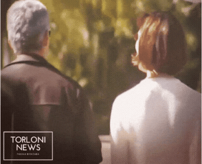 Man Woman Look Each Other Torloni News Logo GIF