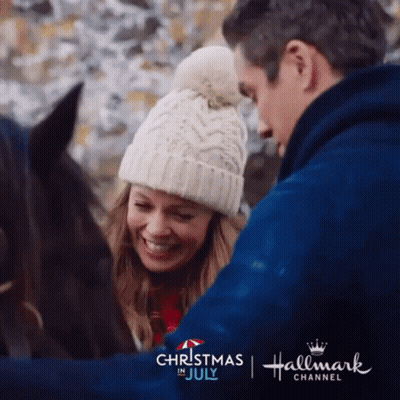 Man Woman With Horses Hallmark Christmas July Ad GIF