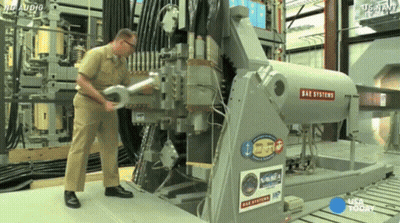 Man Working On Oak Systems Machine GIF