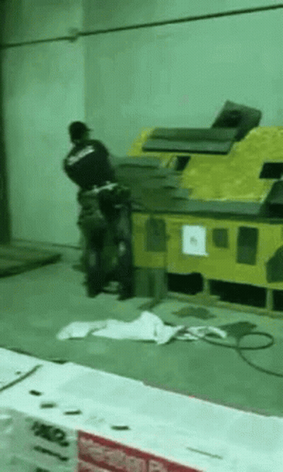 Man Working On Roof With Machine GIF