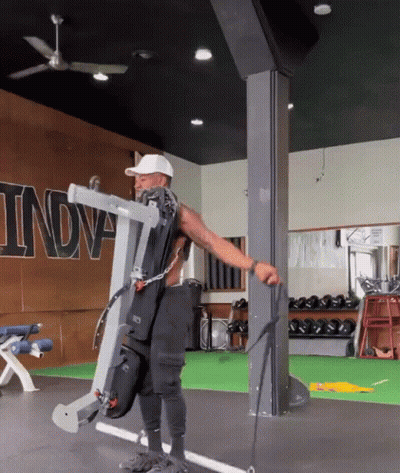 Man Working Out In Gym With Sign Indva GIF
