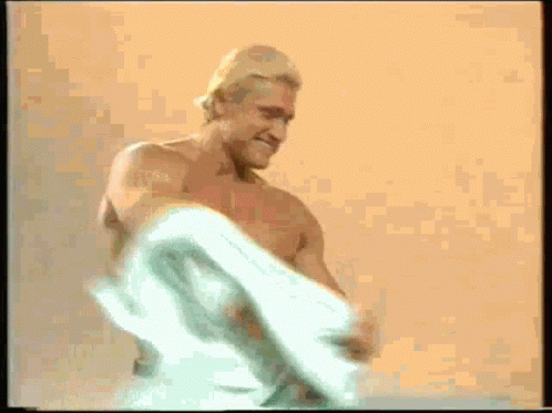 Man Wrapped In Towel Smiling GIF