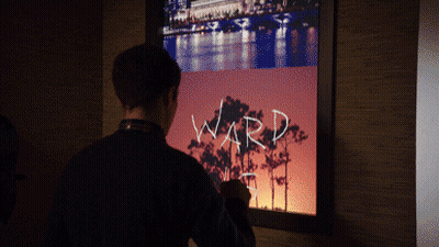 Man Writing Name Ward On Screen GIF