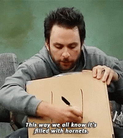 Man Writing On Box This Way We All Know It's Filled With Hornets GIF