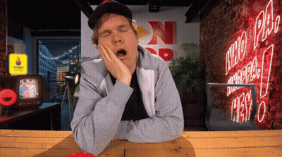 Man Yawning In Front Of Norway Sign GIF
