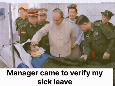 Manager Verifying Sick Leave Beside Hospital Bed GIF