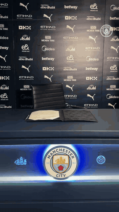 Manchester City Logo On Blue GIF