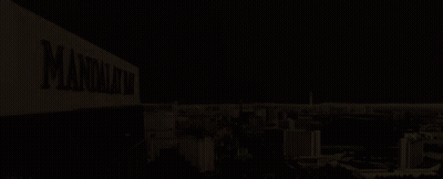 Mandalay Bay Sign Lit Up At Night GIF