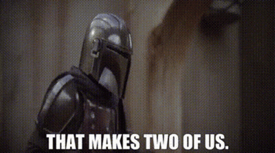 Mandalorian Holding Gun Saying That Makes Two Of Us GIF