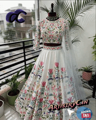 Mannequin In White Dress With Colorful Flowers GIF