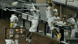 Manny Machado High Five Jump GIF