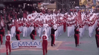 Marching Band Holding Banner Saying Emma GIF