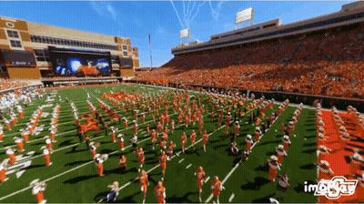 Marching Band Performing On Football Field GIF